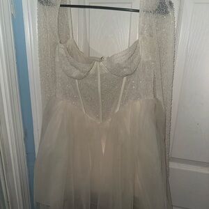 EMBELLISHED LONG SLEEVE TULLE SKIRT MINI DRESS IN IVORY
Size: 8 / regular cup